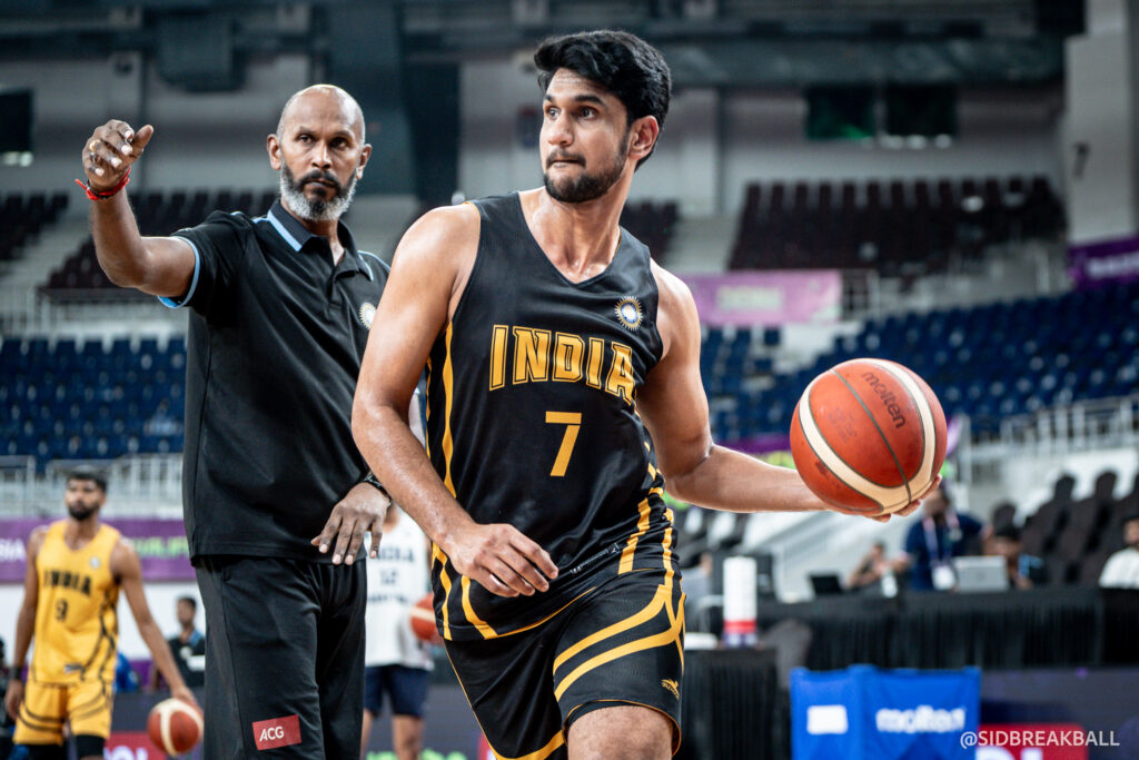 Coach R L Prasad Guntupalli with Muin Bek in Indian basketball team's training camp.